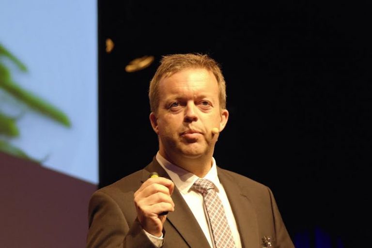 Marine Harvest to cut costs, up debt “to maintain dividend”