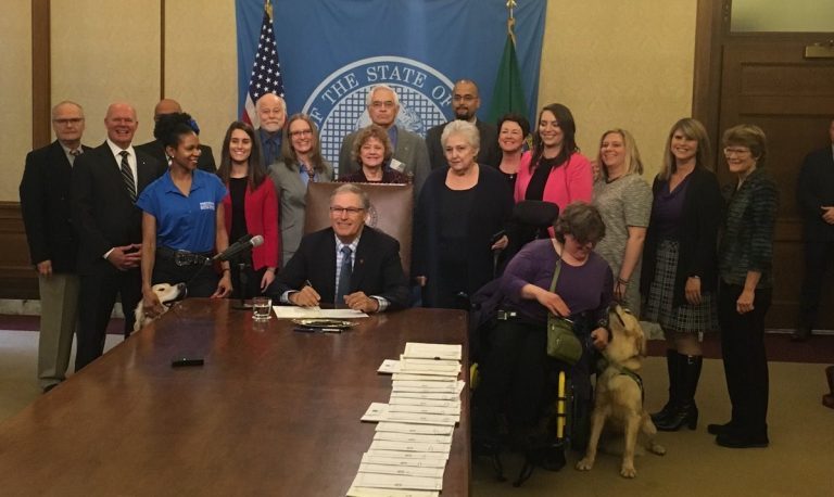 Wash. governor signs bill into law: salmon-farming done by 2025