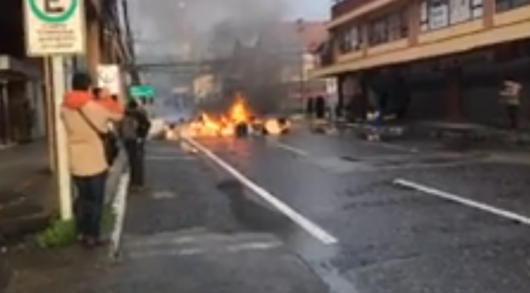 Authorities say Chile’s main salmon transport routes now cleared however protests still roll on