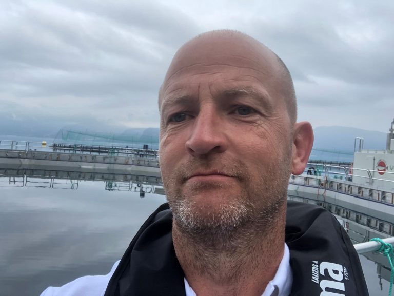 Criminal past resurfaces for closed pen salmon farmer boss