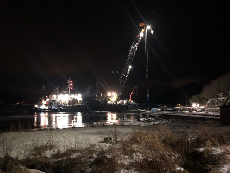 Two sunken salmon farm workboats now raised