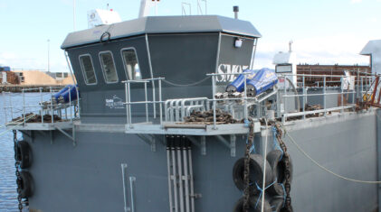 Hybrid feed barge at Cooke Aquaculture Scotland’s Mill Bay organic site. Photo: Gael Force