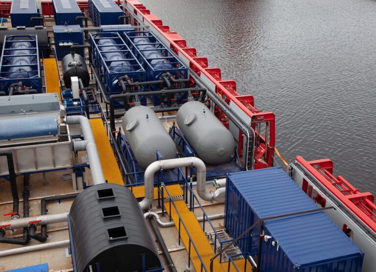 High development costs and currency losses ate up the Benchmark result