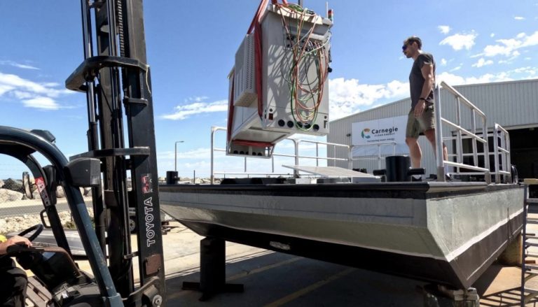 Australian salmon producers trial wave powered feed barges