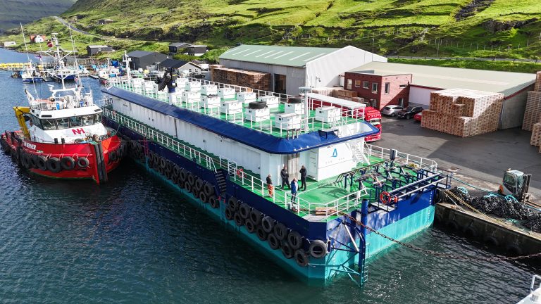 This monster feed barge just changed salmon farming